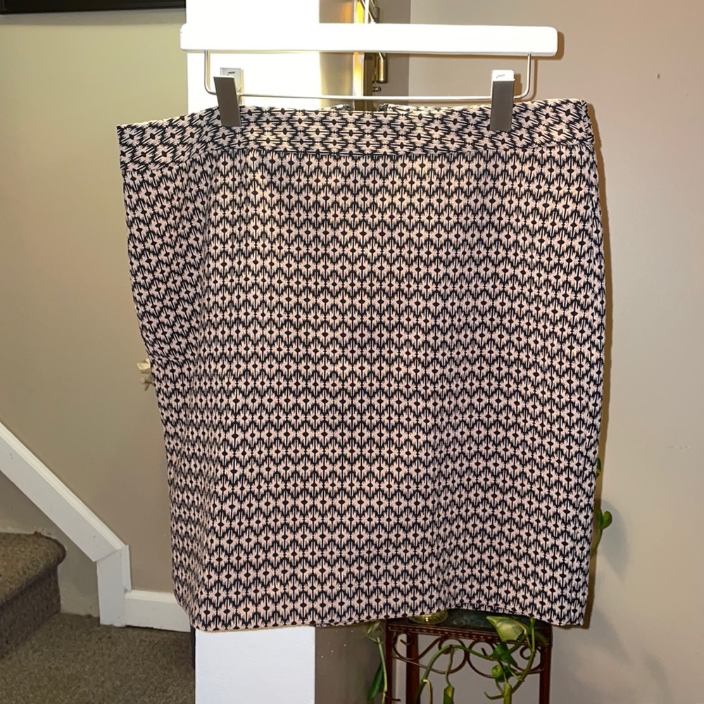 A Cute skirt that can be paired with some nice black boots and a turtleneck.